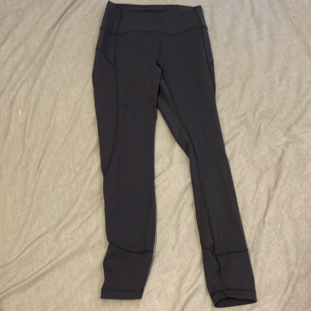 Lululemon 
In Movement Tight 25" *Everlux size 6